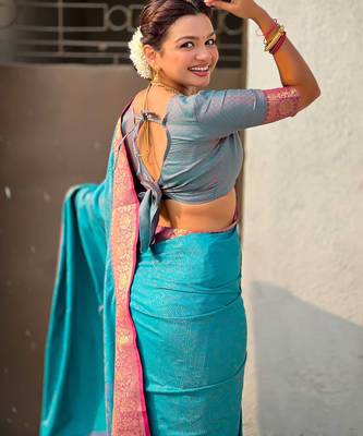 Teal contrast woven zari floral border & pallu work  silk blend   4