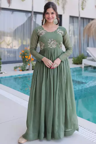 Green color beautiful ceremonial gown for ethnic stylish looks