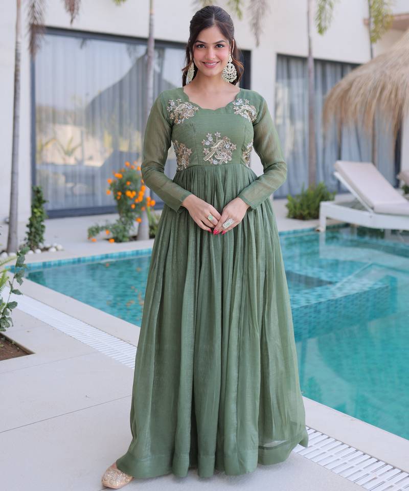 Green color beautiful ceremonial gown for ethnic stylish looks