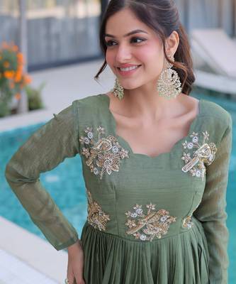 Green color beautiful ceremonial gown for stylish looks 3