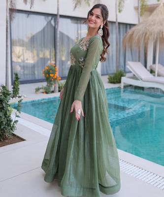 Green color beautiful ceremonial gown for stylish looks 4