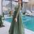 Green color beautiful ceremonial gown for ethnic stylish looks