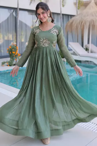 Green color beautiful ceremonial gown for ethnic stylish looks