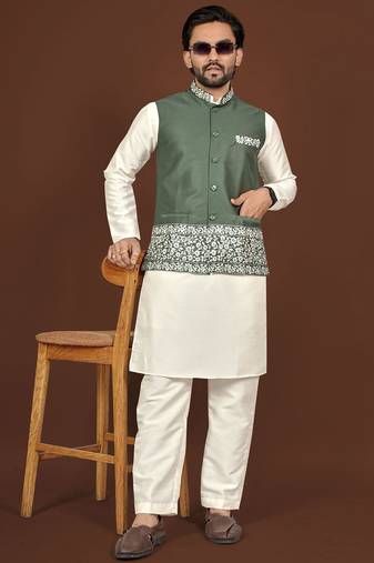 white silk kurta pyjama set with olive green embroidered nehru jacket
