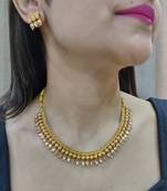 gold tone polki necklace set with layered design