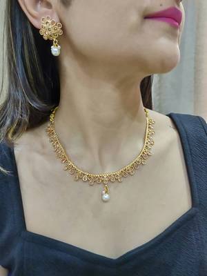 gold polki necklace set with pearl drop and matching earrings 1