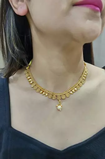 gold plated coin design necklace set with with matching earrings