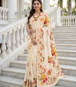 Cream color beautiful russian silk floral position printed work saree