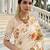 Cream color beautiful russian silk floral position printed work saree