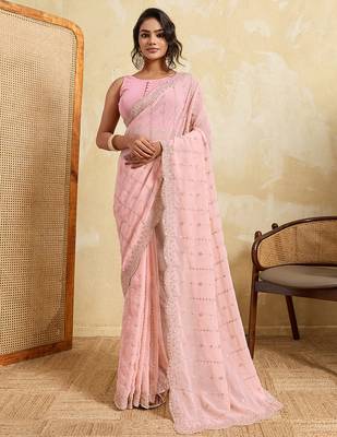 Pink georgette glamorous embroidered saree 1