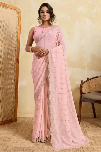 Pink color beautiful georgette fabric glamorous embroidered saree