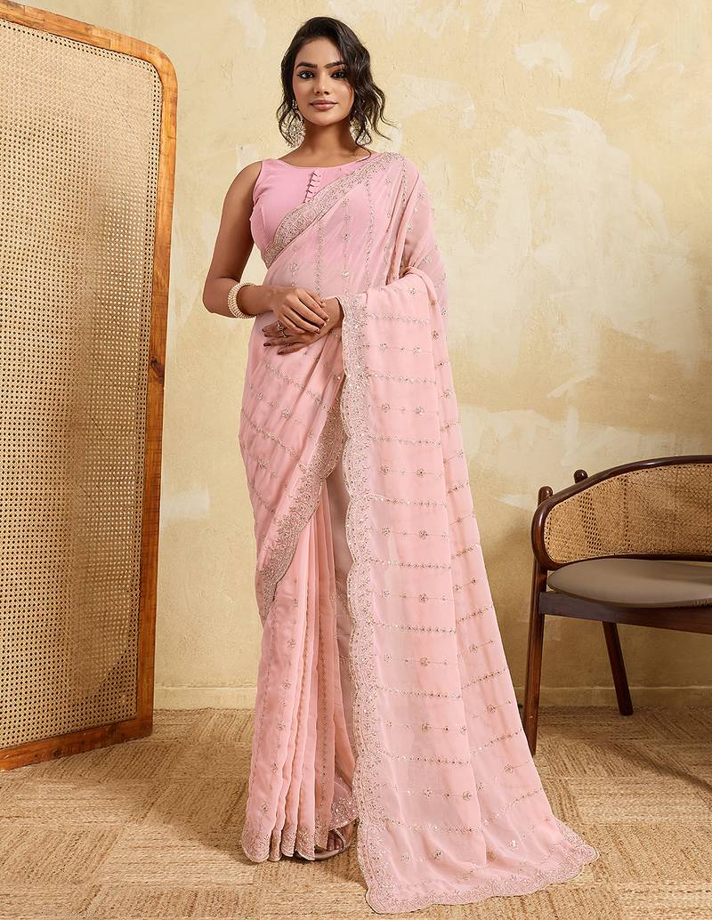 Pink color beautiful georgette fabric glamorous embroidered saree