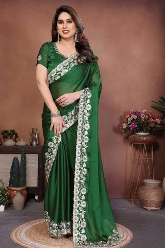 Green color rangoli silk fabric designer embroidery work ceremonial saree