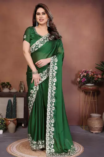 Green color rangoli silk fabric designer embroidery work ceremonial saree