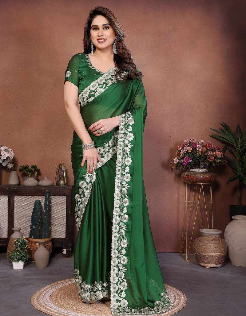 Green color rangoli silk fabric designer embroidery work ceremonial saree