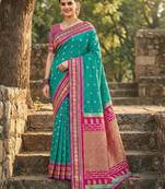Sea green color soft silk fabric woven designer graceful ethnic saree