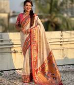 Cream color sophisitcated paithani silk saree with meenakari woven designer