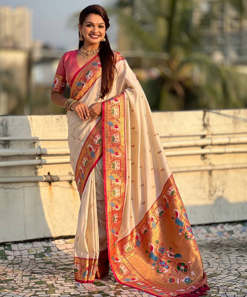 Cream color sophisitcated paithani silk saree with meenakari woven designer