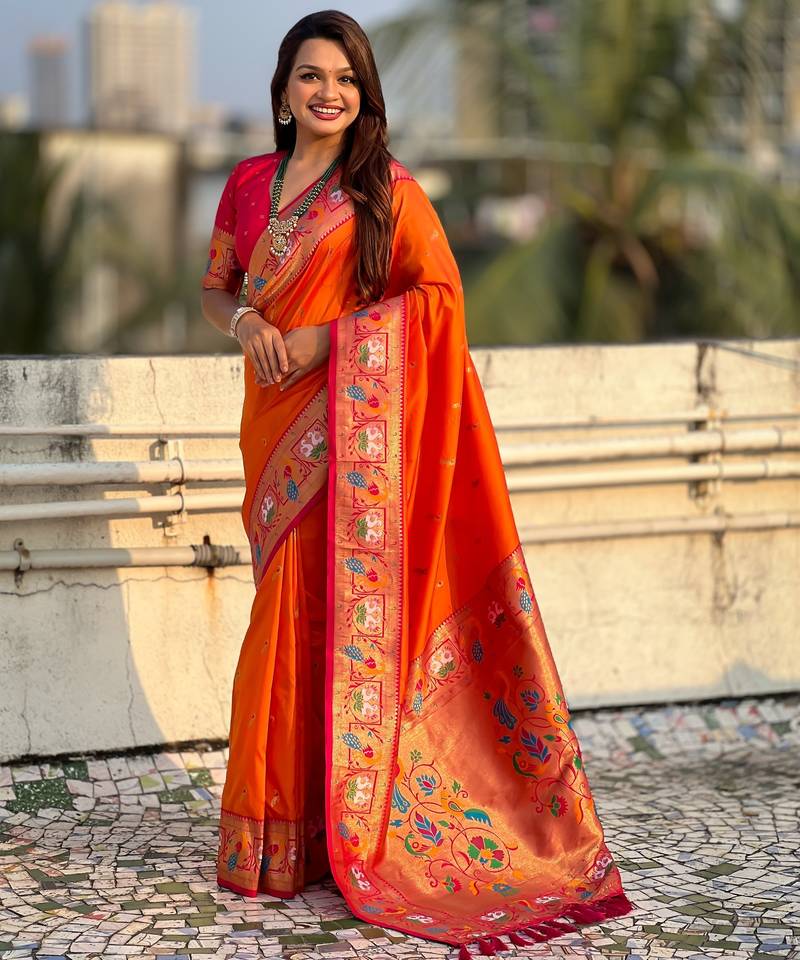 Orange color sophisitcated paithani silk saree with meenakari woven designer