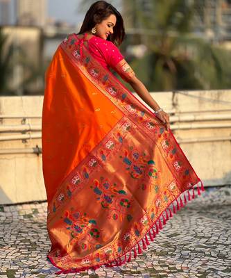 Orange sophisitcated paithani silk blend saree with meenakari woven  2
