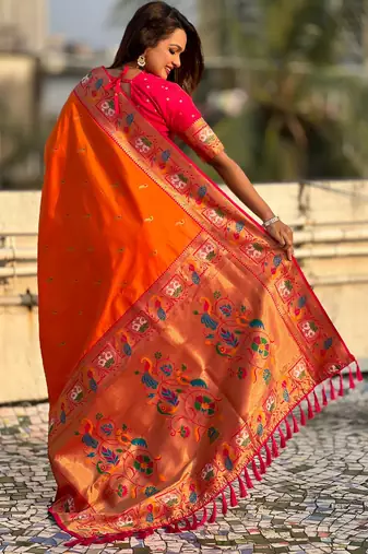 Orange sophisitcated paithani silk blend saree with meenakari woven 