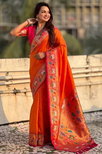 Orange sophisitcated paithani silk blend saree with meenakari woven 