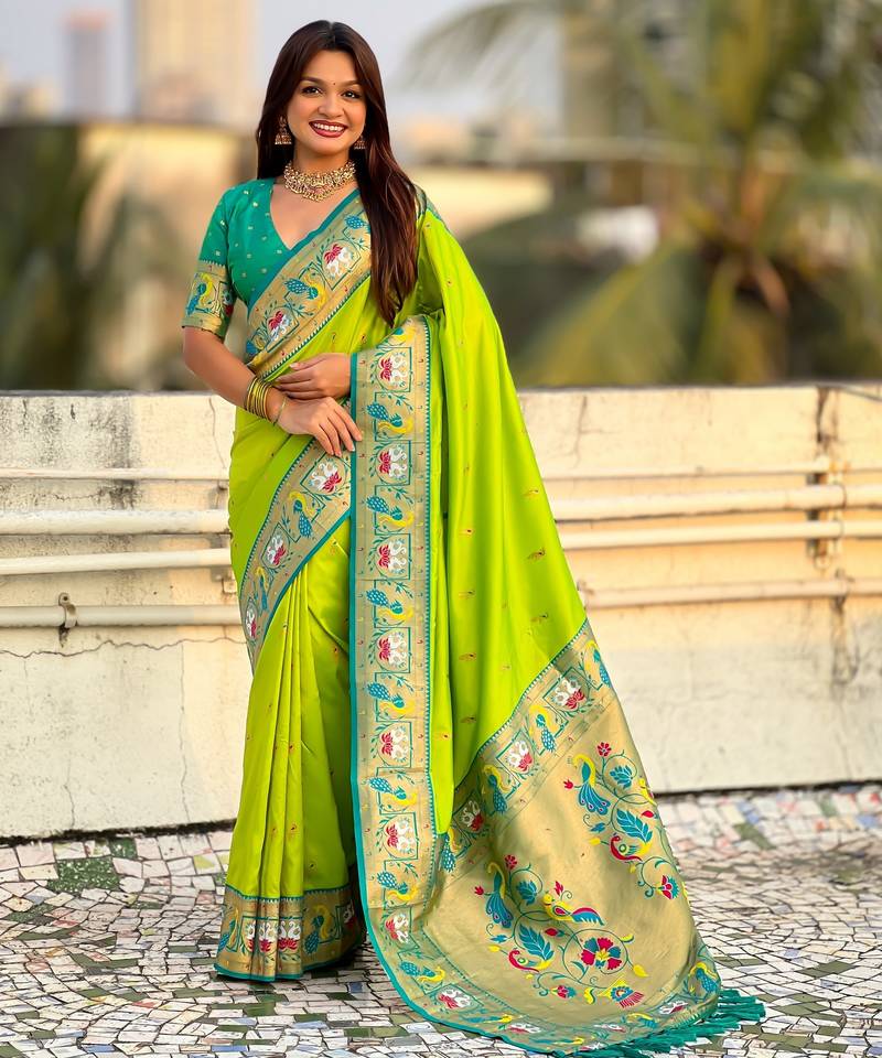 Parrot green color sophisitcated paithani silk saree with meenakari woven designer