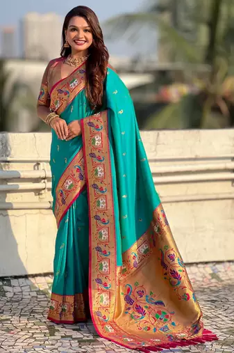 Sea green color sophisitcated paithani silk saree with meenakari woven designer