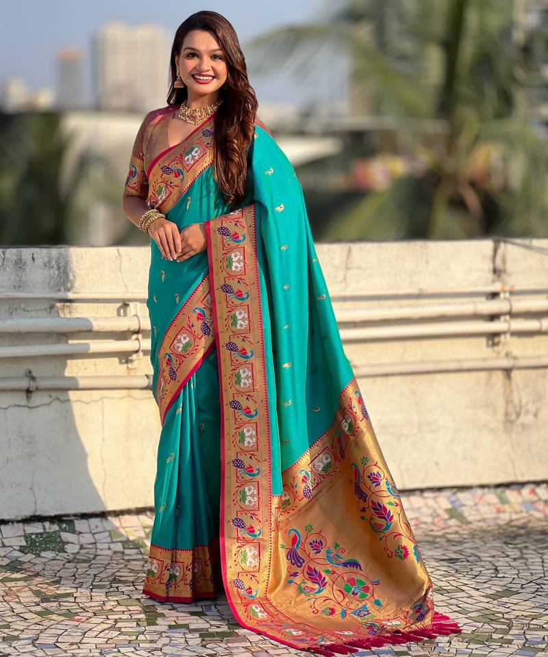 Sea green color sophisitcated paithani silk saree with meenakari woven designer