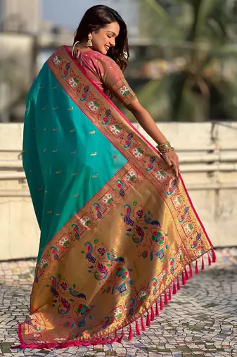 Sea green sophisitcated paithani silk blend saree with meenakari woven 