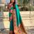 Sea green color sophisitcated paithani silk saree with meenakari woven designer