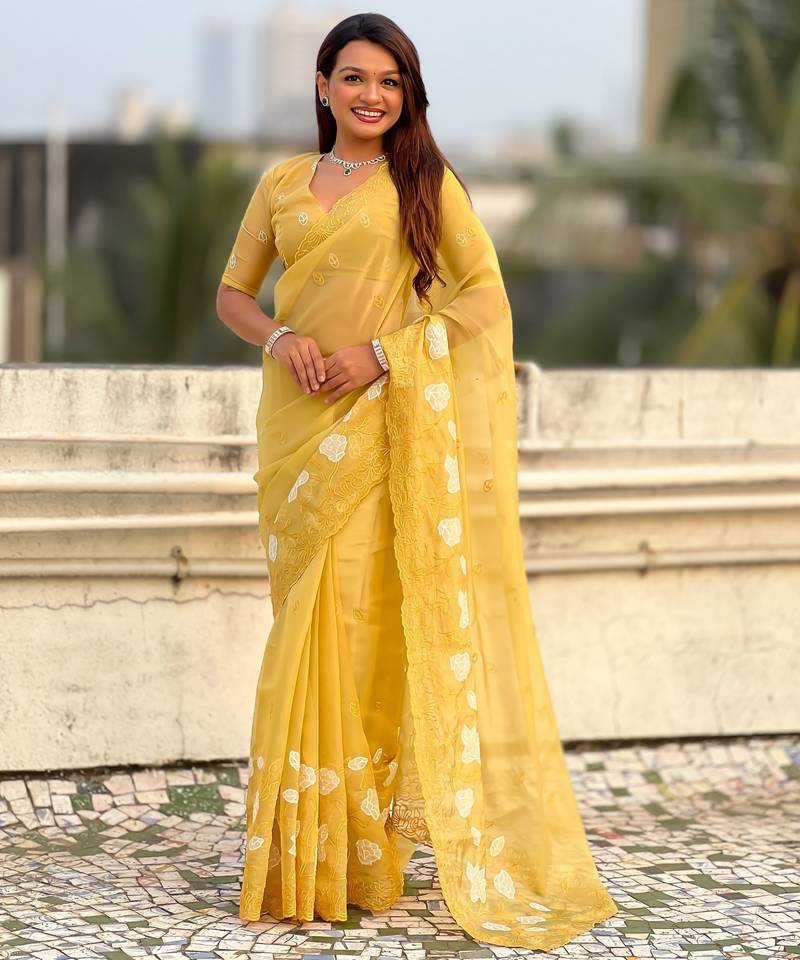 Yellow color chanda kora silk fabric beautful floral embroidery work ceremonial saree
