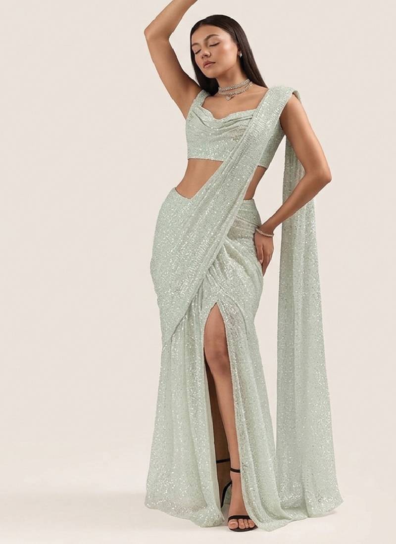 Mint green embroidered georgette pre draped saree set