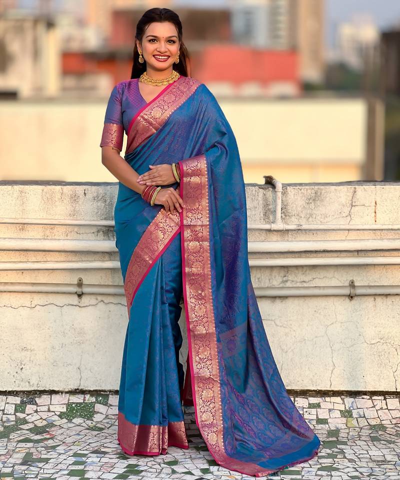Blue color graceful soft silk fabric woven designer saree