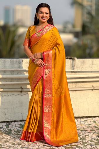 Mustard color graceful soft silk fabric woven designer saree