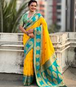 Yellow woven zari traditional motifs work silk blend   