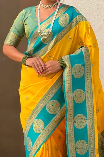 Yellow woven zari traditional motifs work silk blend   