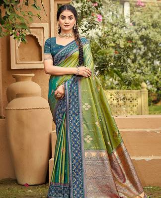 Green soft silk blend woven ethnic ceremonial saree 1