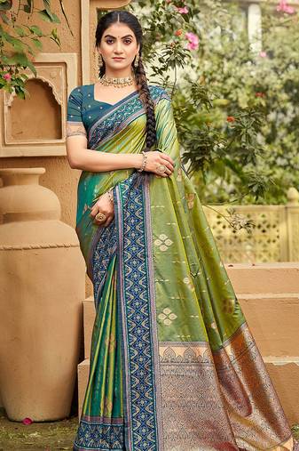 Green color soft silk fabric woven designer ethnic ceremonial saree