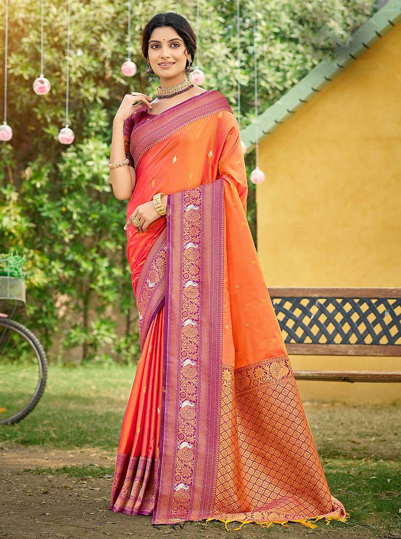 Orange color woven designer soft silk fabric trendy rich looks saree