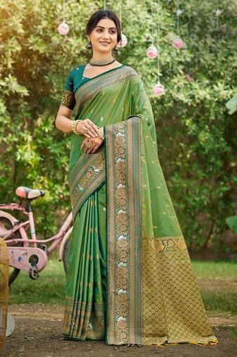 Green color woven designer soft silk fabric trendy rich looks saree