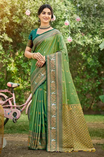 Green color woven designer soft silk fabric trendy rich looks saree