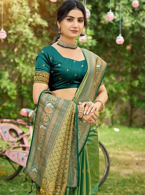 Green woven soft silk blend trendy rich looks saree 2