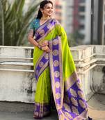 Light parrot green woven zari traditional motifs work silk blend   