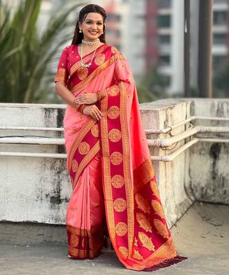 Peach woven zari traditional motifs work silk blend    1