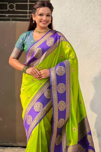 Parrot green soft silk blend woven girlie rich look saree