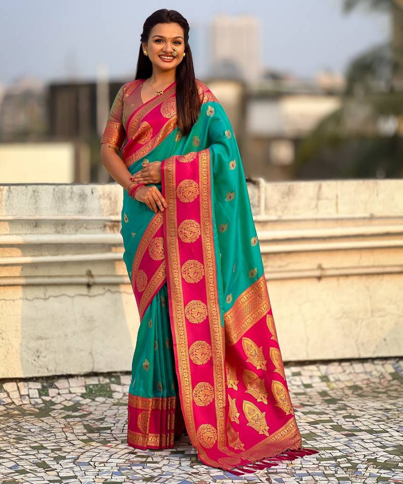 Sea green color soft silk fabric woven designer girlie rich look saree