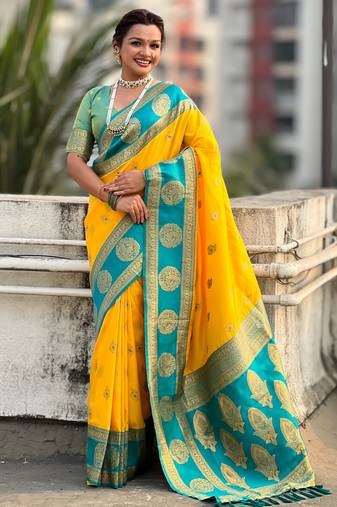 Yellow color soft silk fabric woven designer girlie rich look saree