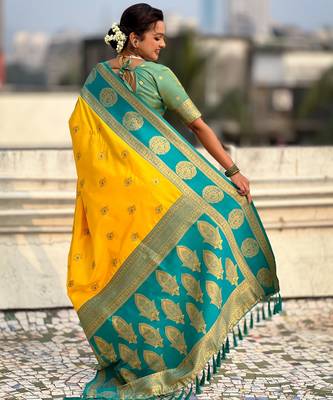 Yellow soft silk blend woven girlie rich look saree 2
