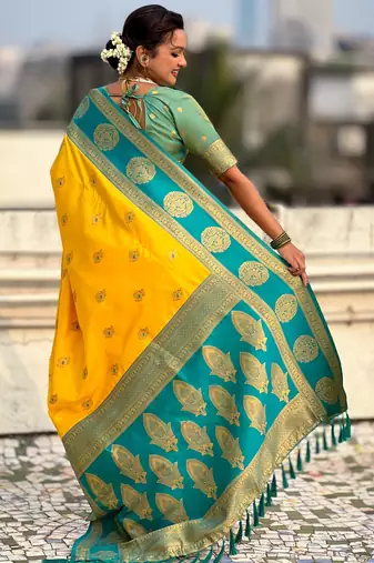 Yellow color soft silk fabric woven designer girlie rich look saree